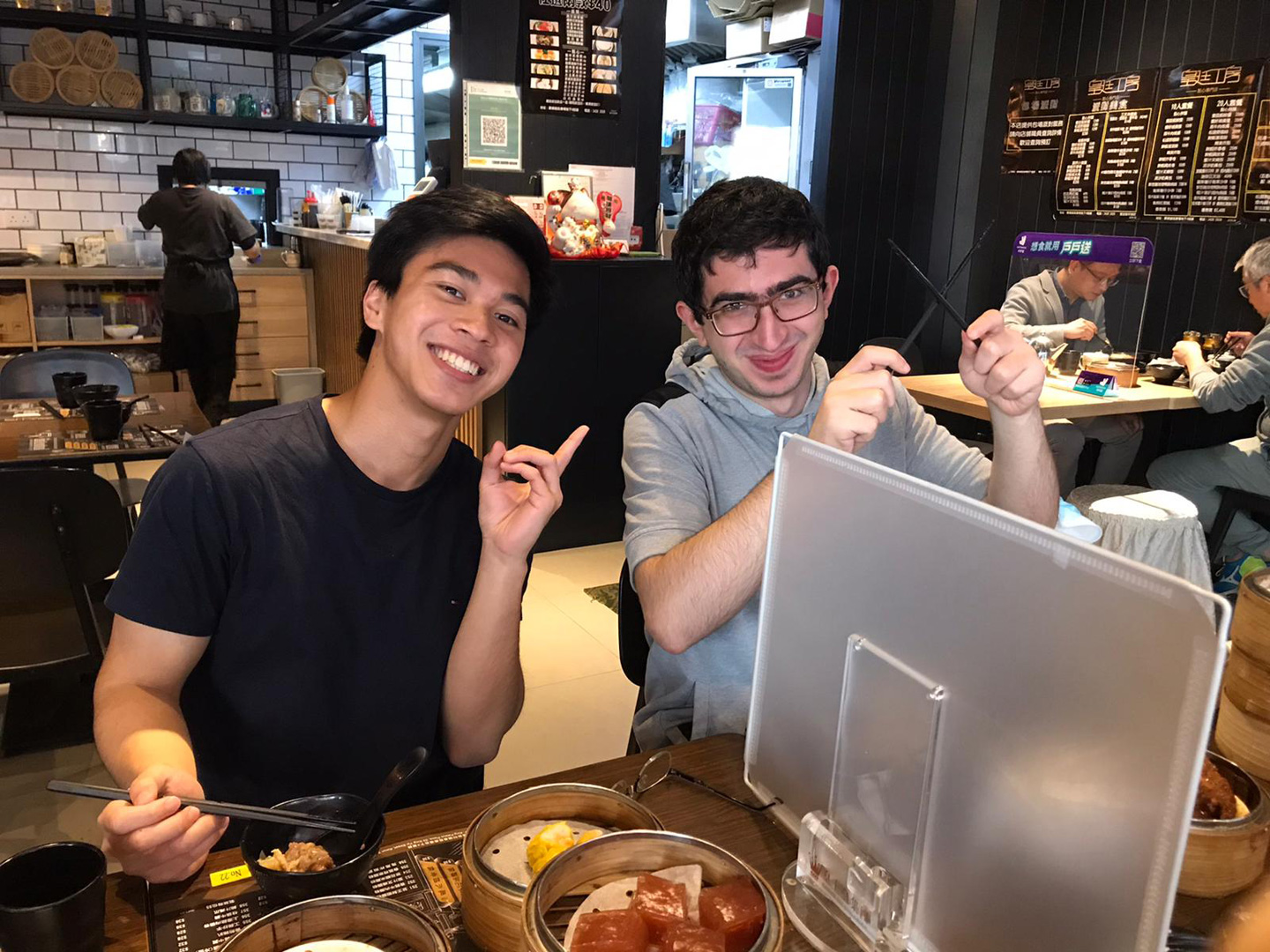 Andy, gourmet of Cantonese dishes, and Khachatur, apprentice of chopstick mastery <em>(courtesy of interviewee)</em>