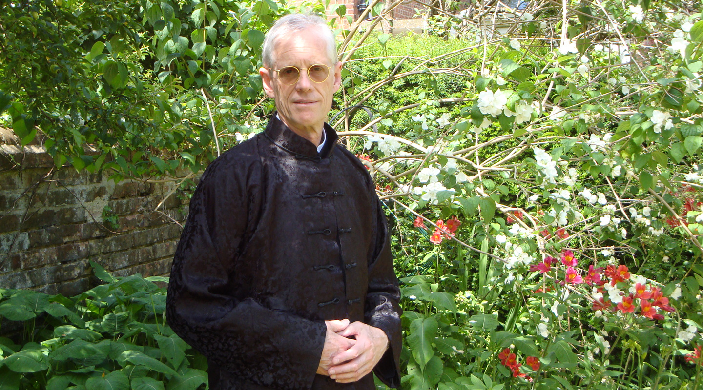 Dressing in <em>cheongsam</em> in his home garden in Oxford