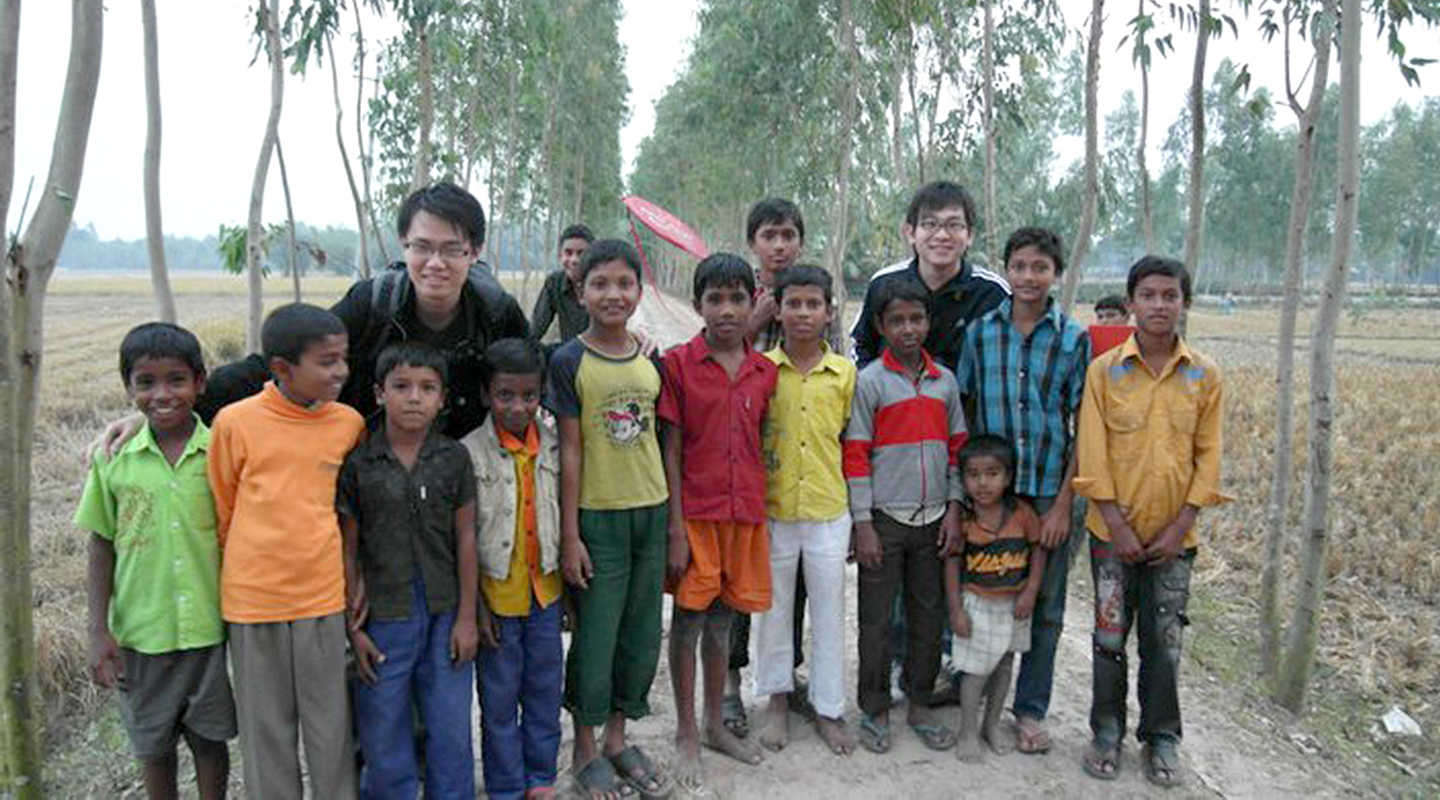 In his Year 3 summer holidays, Tony interned at Grameen Bank in Bangladesh, a social business founded by Nobel peace prize winner Muhammad Yunus. The picture on top features him and Yunus. Village kids hadn’t seen a camera before; playing about with it, they asked him to take a picture of them together