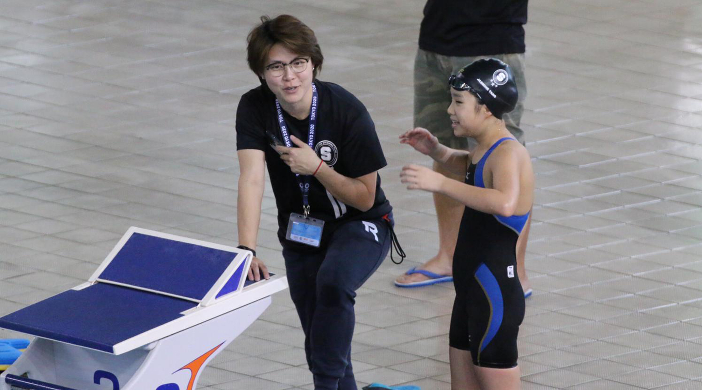 Word of advice from Sherry to her student during swimming tournament <em>(courtesy of interviewee)</em>