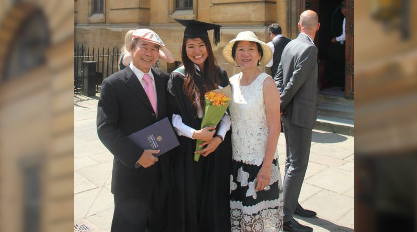 With parents at the graduation for Master of Studies in Archaeology <em>(courtesy of interviewee)</em>
