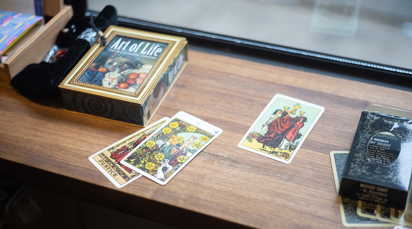 Tarot is an encyclopedia of Western history, culture and knowledge, and a literary background helps one delve deep into the significance of the cards. ‘The Three of Cups refers to celebration and social life at first glance, but to me it reenacts the beginning of <em>Macbeth</em> where three witches gather to hatch a sinister plot. The Ten of Pentacles articulates the ending of <em>The Odyssey</em>, where the white-haired Odysseus returns home after 20 years away for Trojan War, unrecognizable to his wife and son, and that only his loyal dog knows him. So the abundance, wealth and fulfilment depicted by this card come only after years of toil and hardship. One returns home a silver-haired man.’
