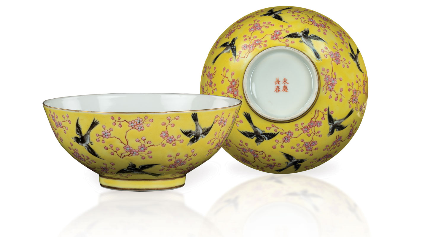 A pair of <em>famille-rose</em> bowls decorated with magpies and prunus on a yellow glaze ground 
<em>Yongqing changchun</em> mark<br />
Jingdezhen ware, Jiangxi province Qing, Tongzhi period (1862–1874)<br />
Gift of Mr. Anthony Cheung