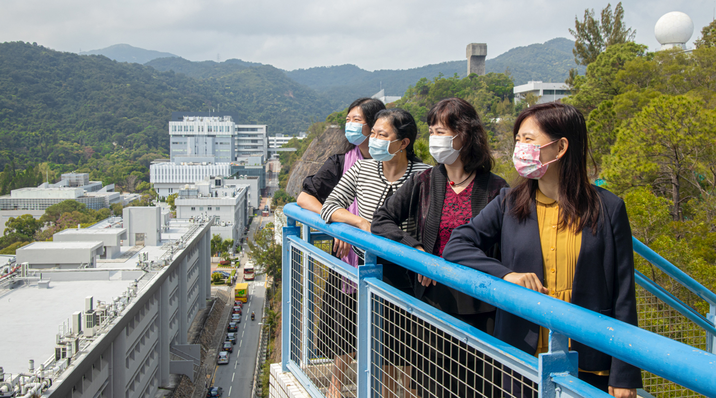 (From left) Ms. Angel Leung, Ms. Corinna Lee, Ms. Betty To and Ms. Fion Law look out from the roof of Mong Man Wai Building where the Human Resources Office situates
