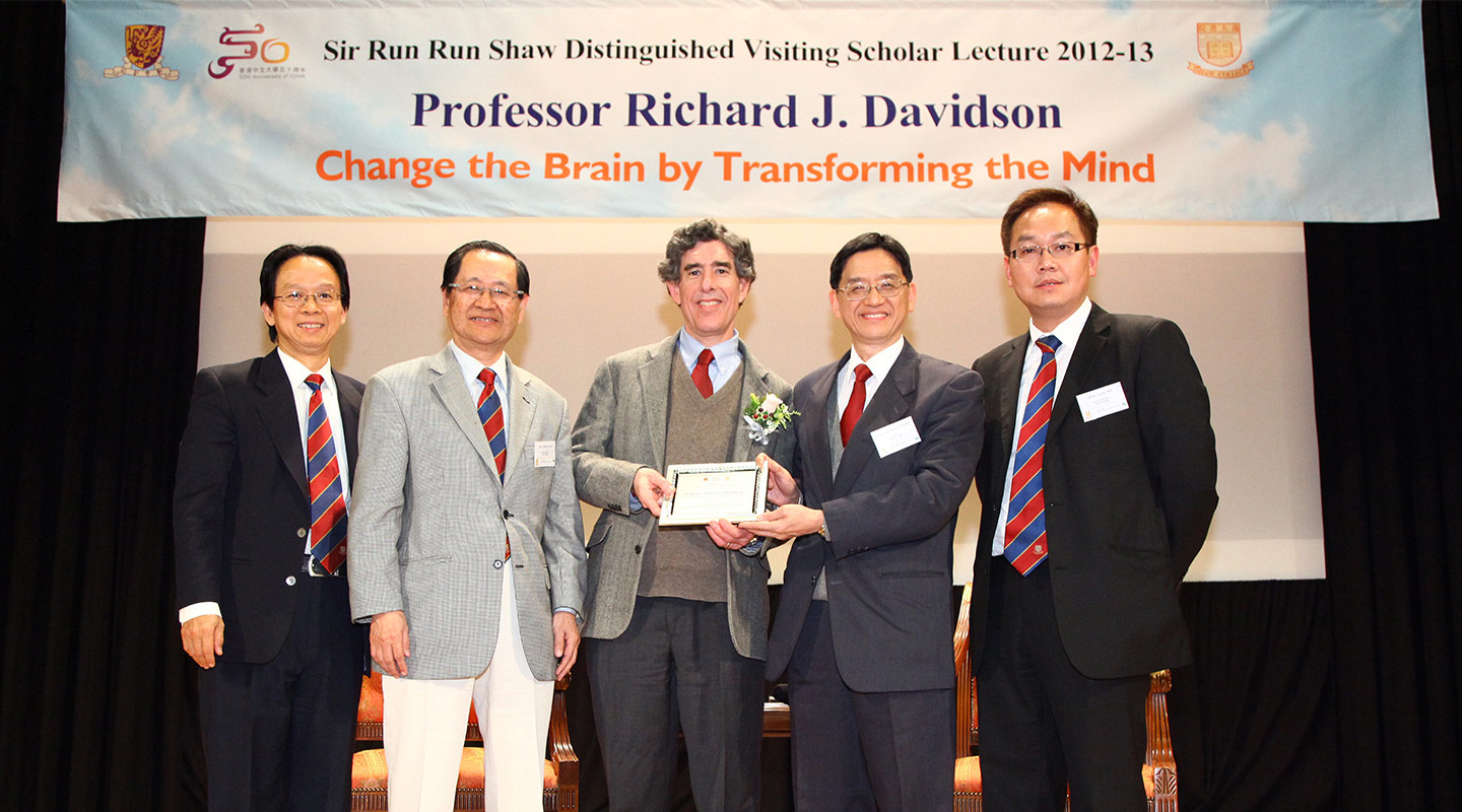 College Head Prof. Andrew C.F. Chan present a souvenir to Prof. Richard J. Davidson