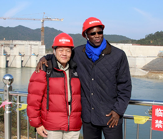 <em>Professor Lam with Mr. Ousmane Dione of the World Bank in a trip to inspect a dam under construction in Wuxikou, Jiangxi Province</em>